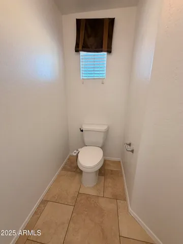 a bathroom with a toilet