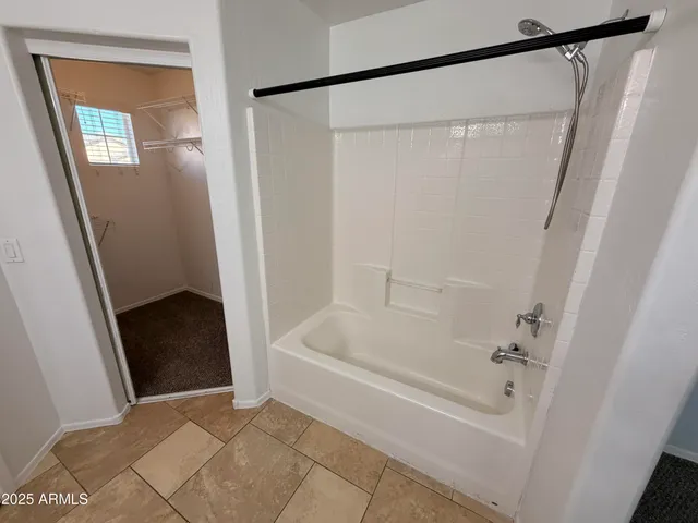 a bathroom with a bathtub