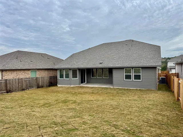 a front view of a house with yard
