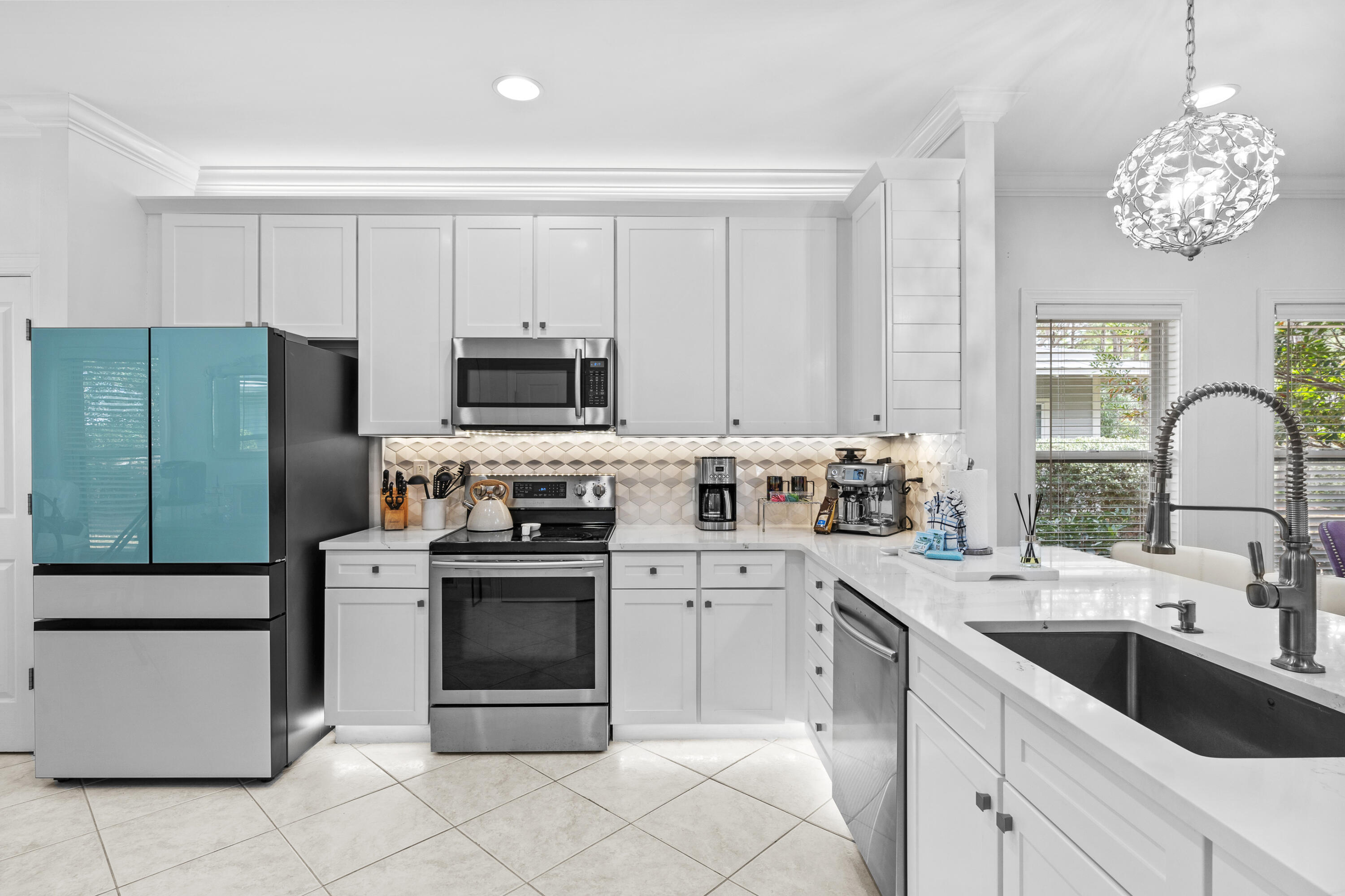 Undisclosed Address Miramar Beach, FL 32550 - Photo 11 of 51 a kitchen with a sink stove and refrigerator