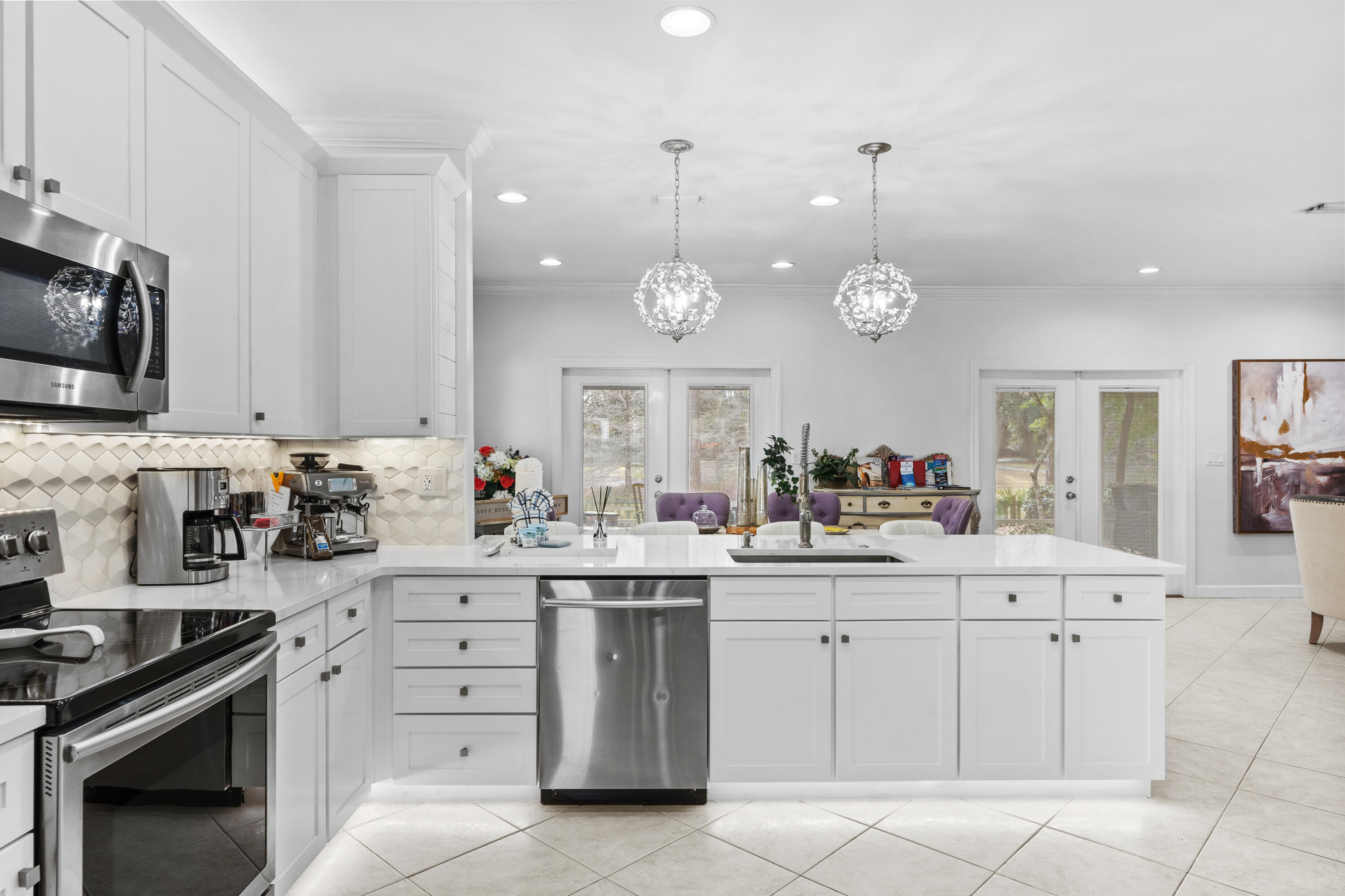 Undisclosed Address Miramar Beach, FL 32550 - Photo 12 of 51 a kitchen with a stove oven and cabinets
