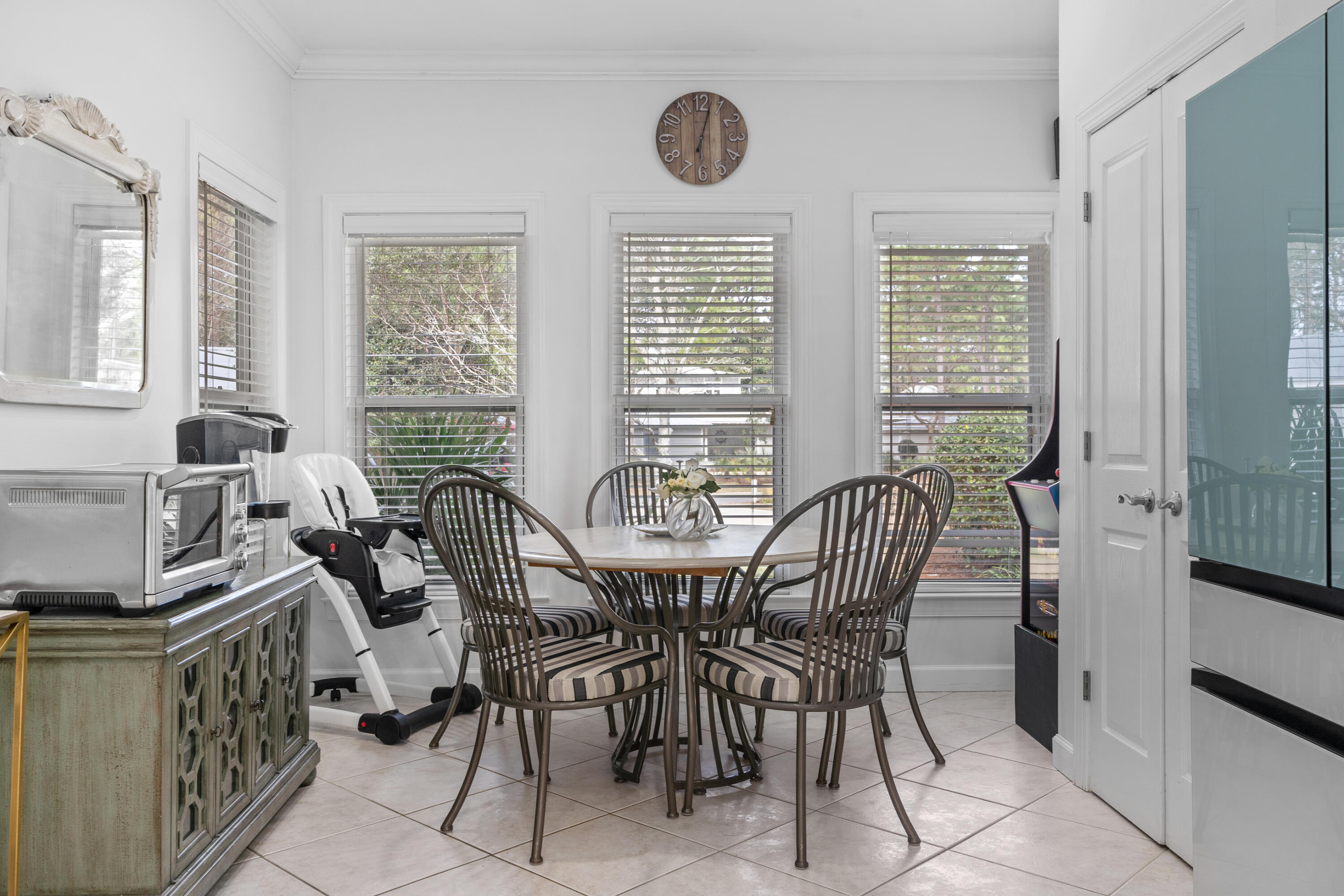 Undisclosed Address Miramar Beach, FL 32550 - Photo 14 of 51 a view of a dining room with furniture window and outside view