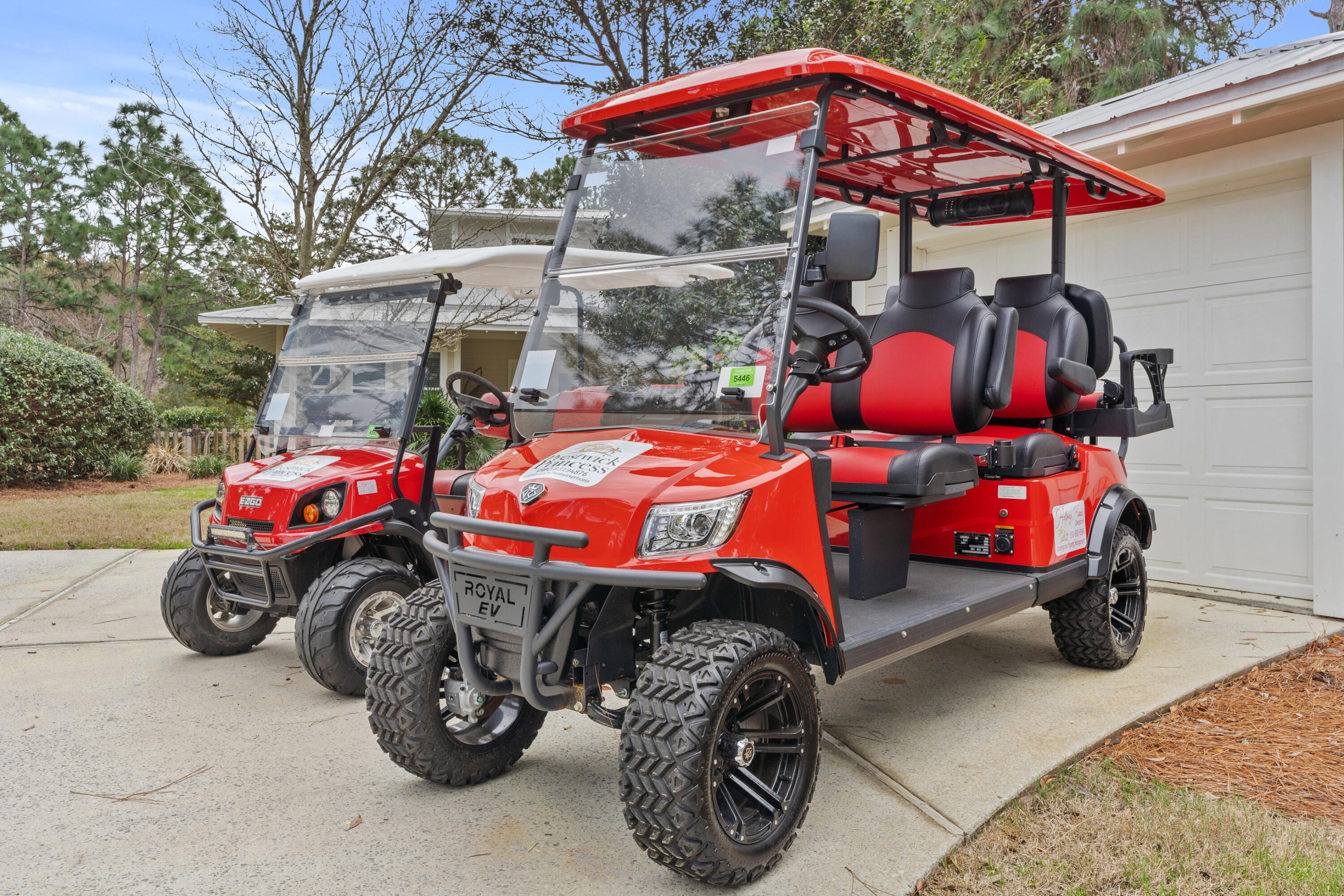Undisclosed Address Miramar Beach, FL 32550 - Photo 21 of 51 a blue and red car parked in front of a house