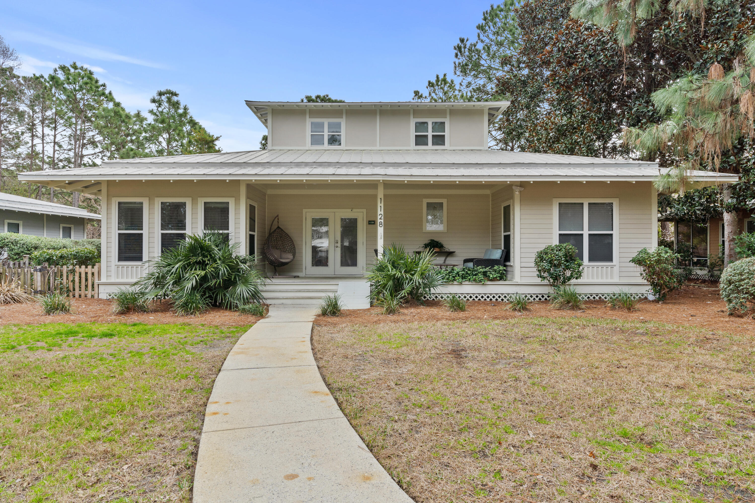 Undisclosed Address Miramar Beach, FL 32550 - Photo 22 of 51 a front view of house with yard and green space
