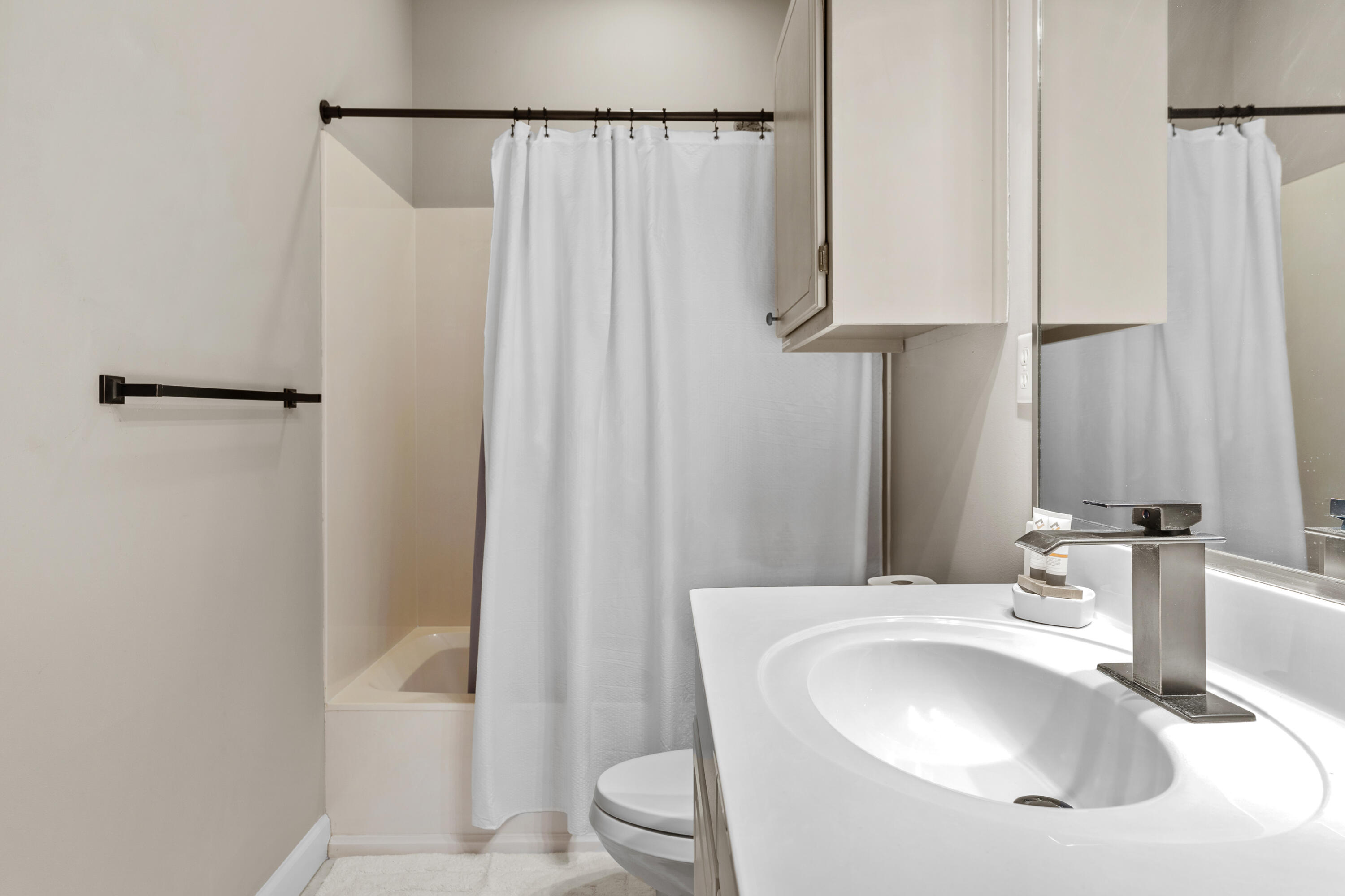 Undisclosed Address Miramar Beach, FL 32550 - Photo 23 of 51 a bathroom with a sink a toilet and shower