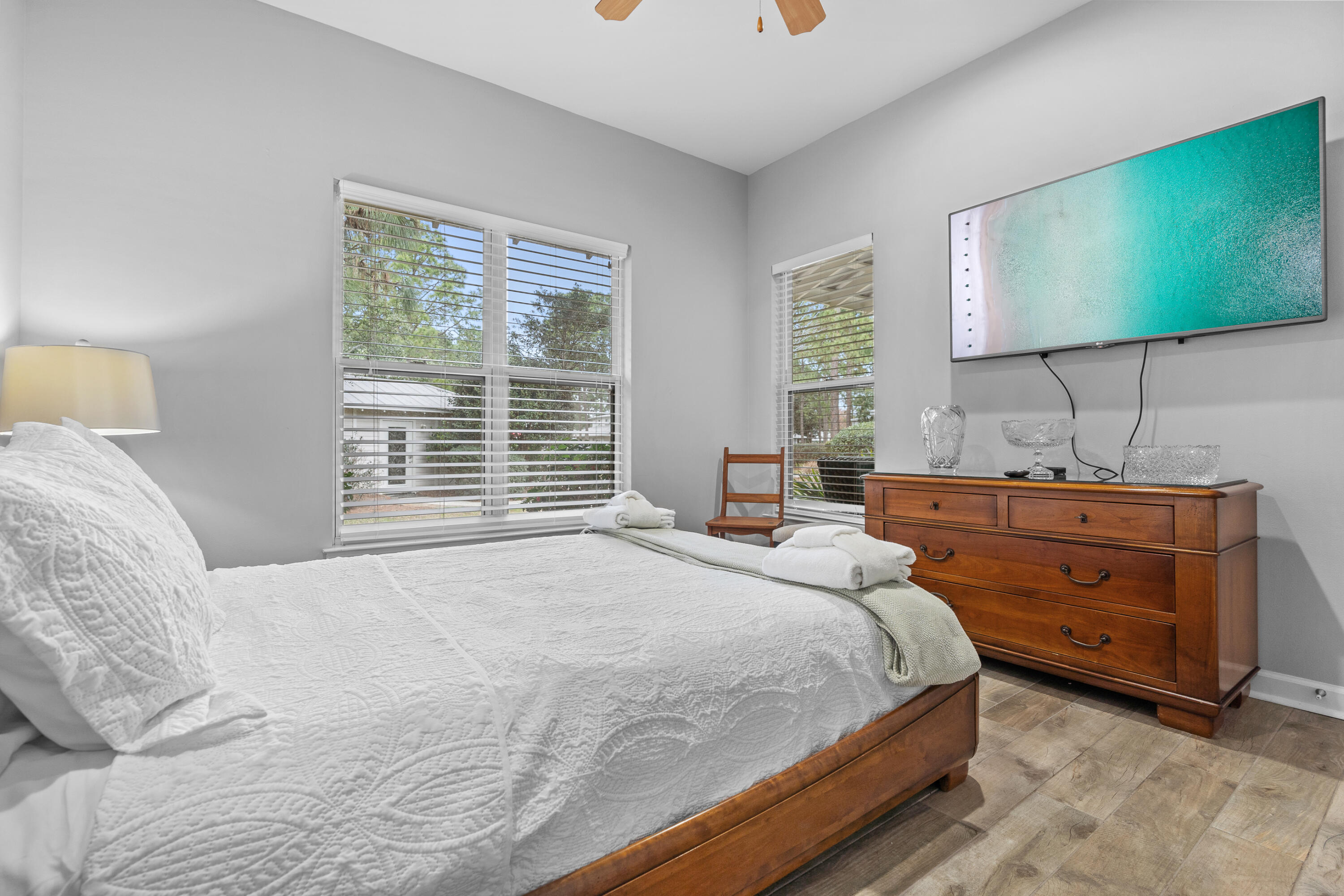 Undisclosed Address Miramar Beach, FL 32550 - Photo 27 of 51 a bedroom with a bed and window