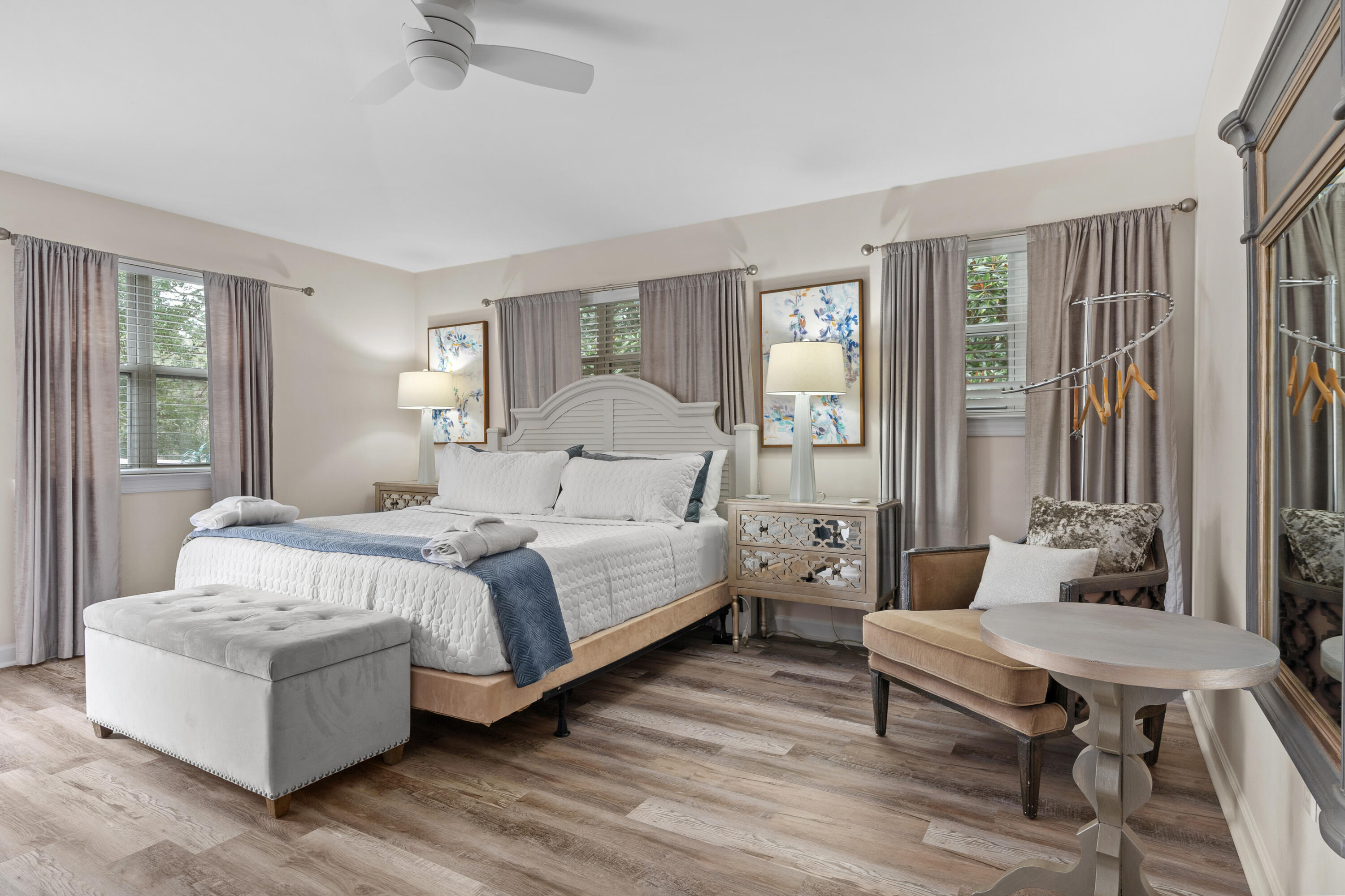 Undisclosed Address Miramar Beach, FL 32550 - Photo 30 of 51 a bedroom with a bed wooden floor and window