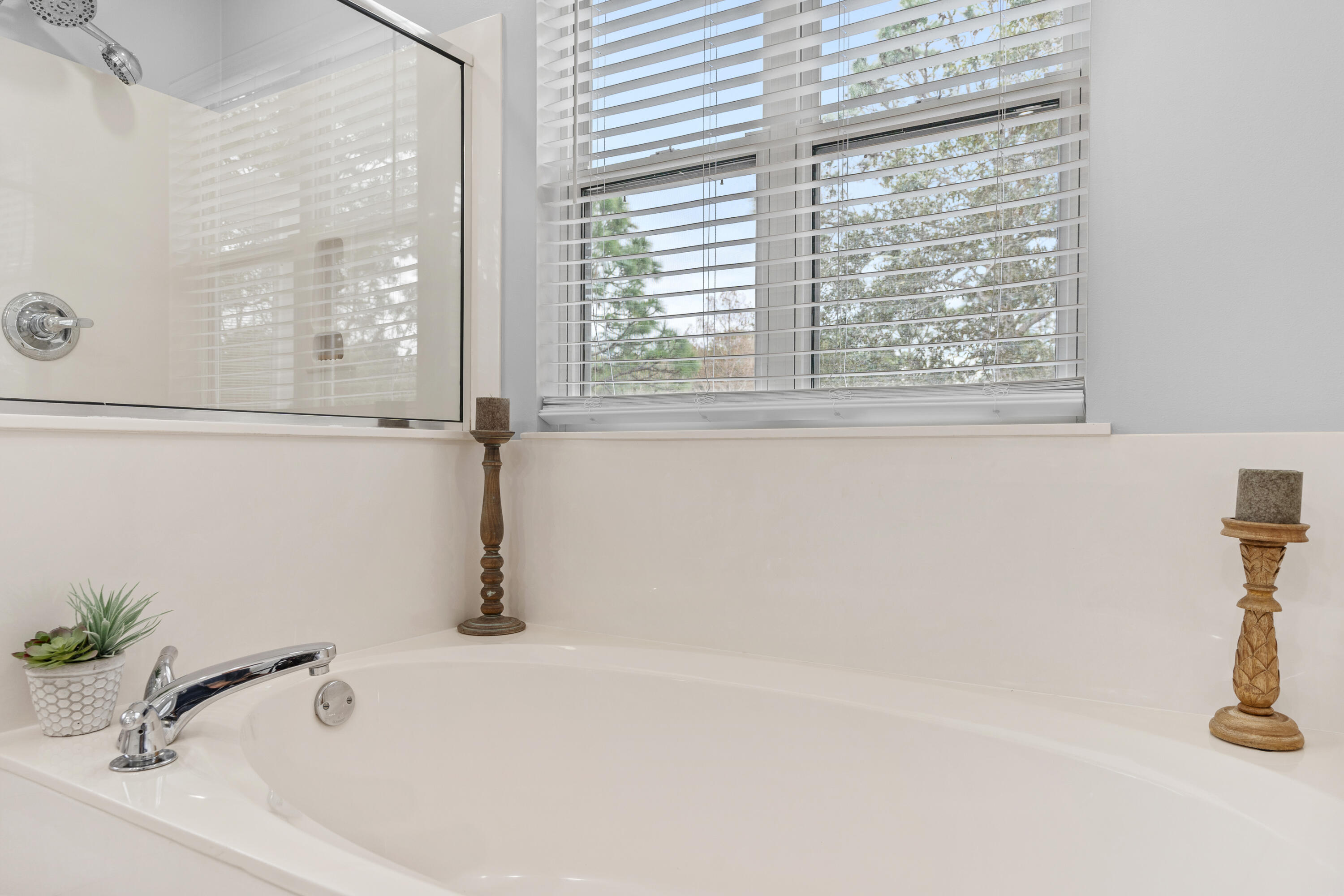 Undisclosed Address Miramar Beach, FL 32550 - Photo 36 of 51 a bath tub sitting next to a window