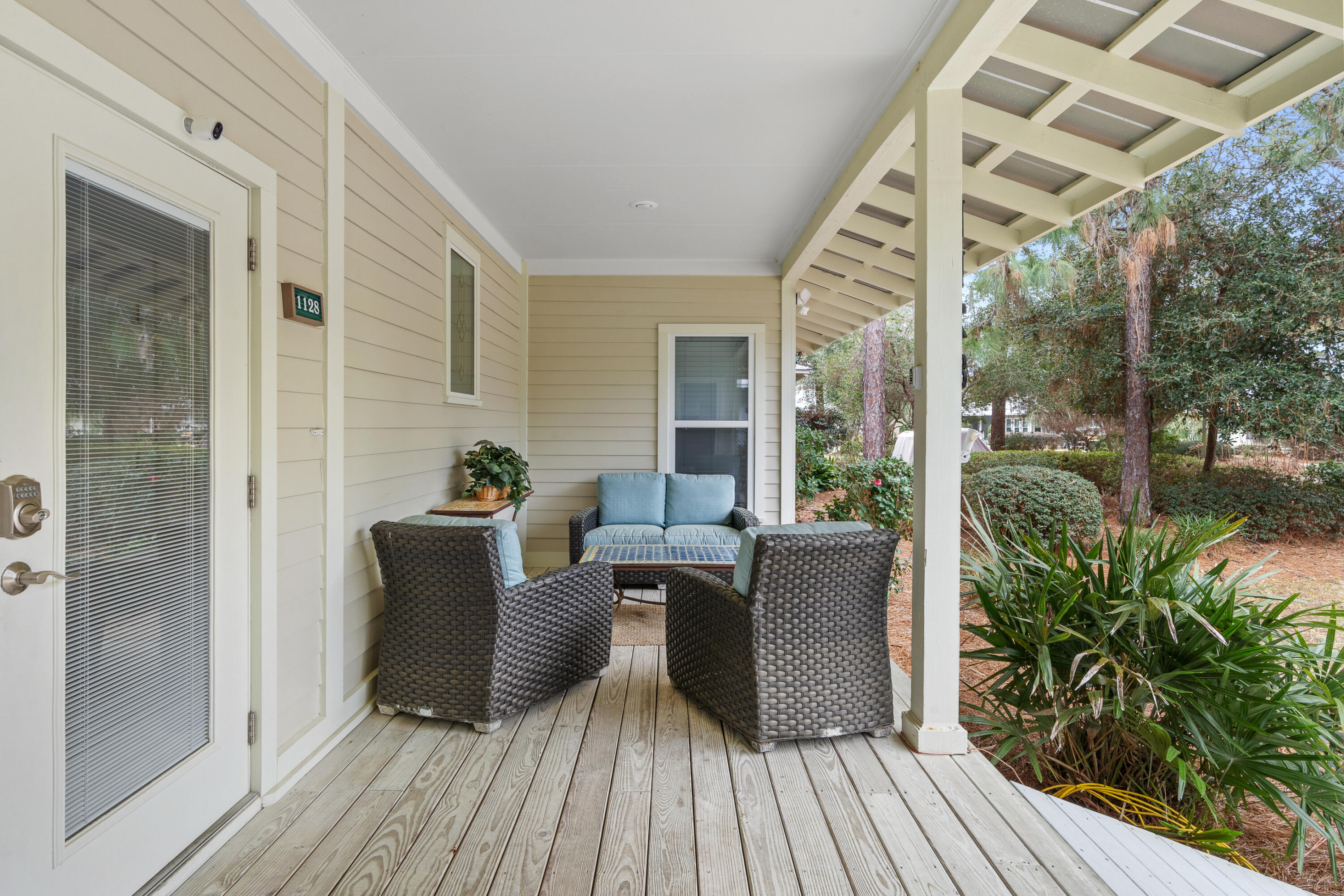 Undisclosed Address Miramar Beach, FL 32550 - Photo 41 of 51 a view of a house with porch and wooden floor