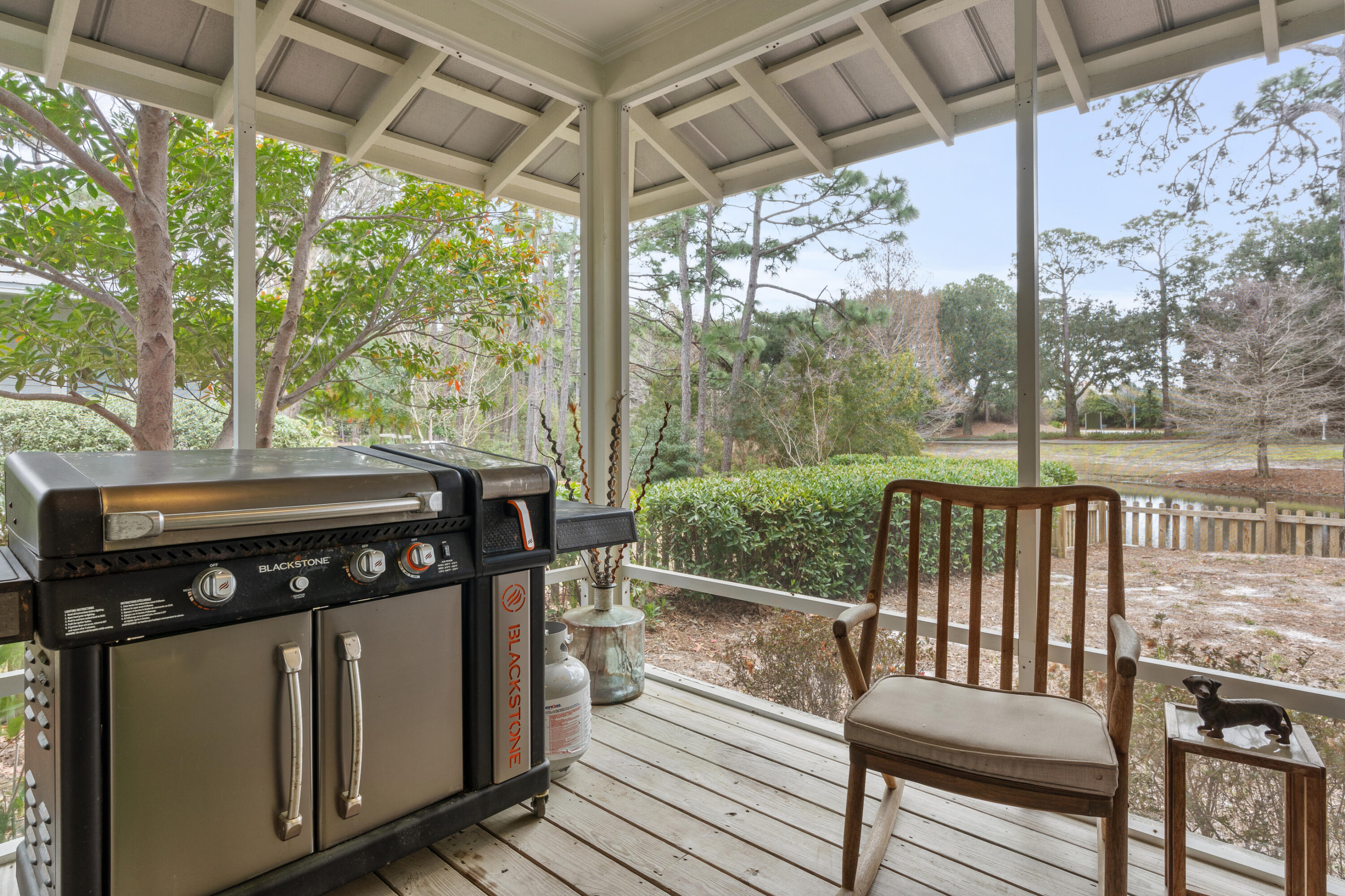 Undisclosed Address Miramar Beach, FL 32550 - Photo 43 of 51 a view of a porch with furniture and wooden floor