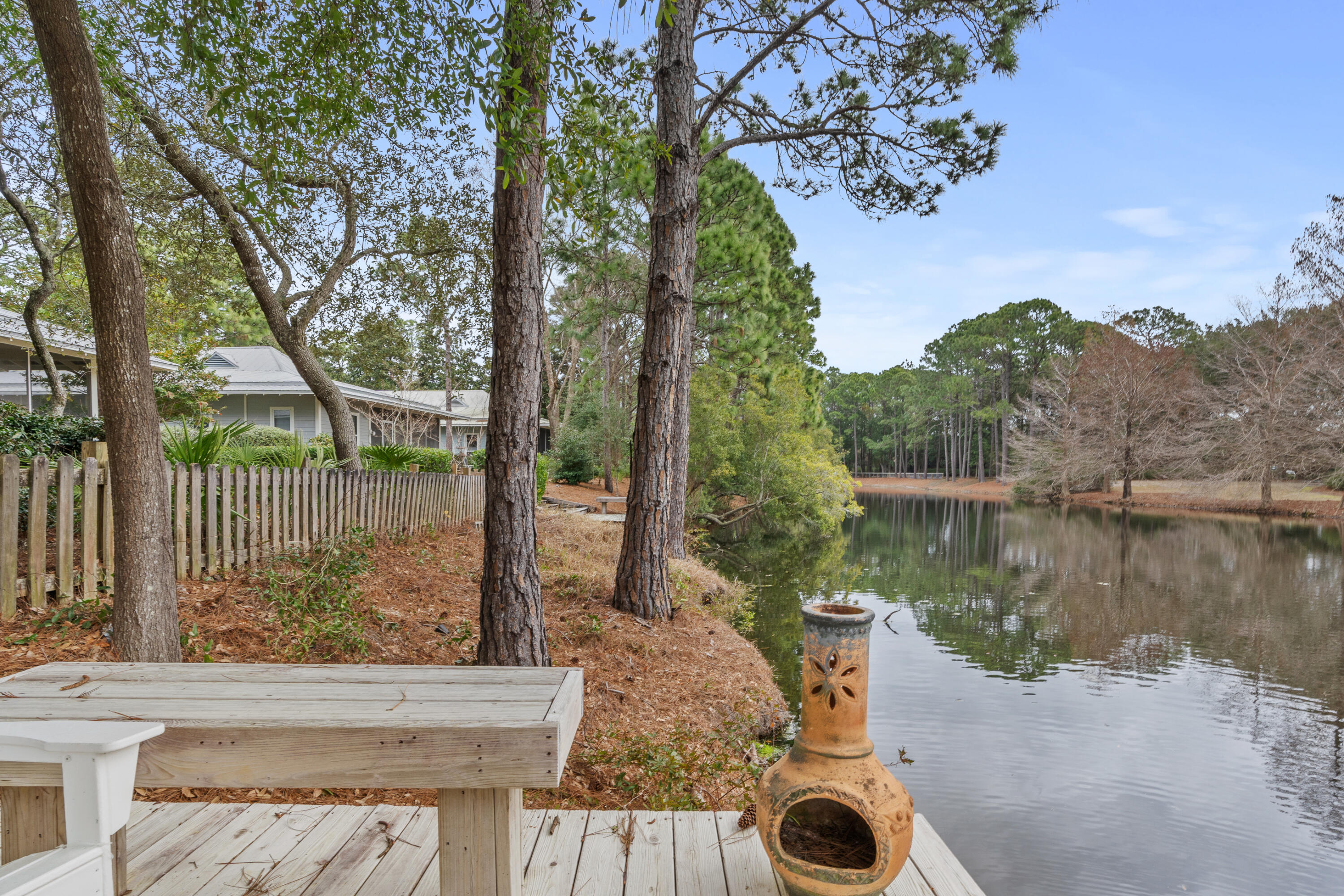 Undisclosed Address Miramar Beach, FL 32550 - Photo 47 of 51 a view of a wooden deck and a lake view