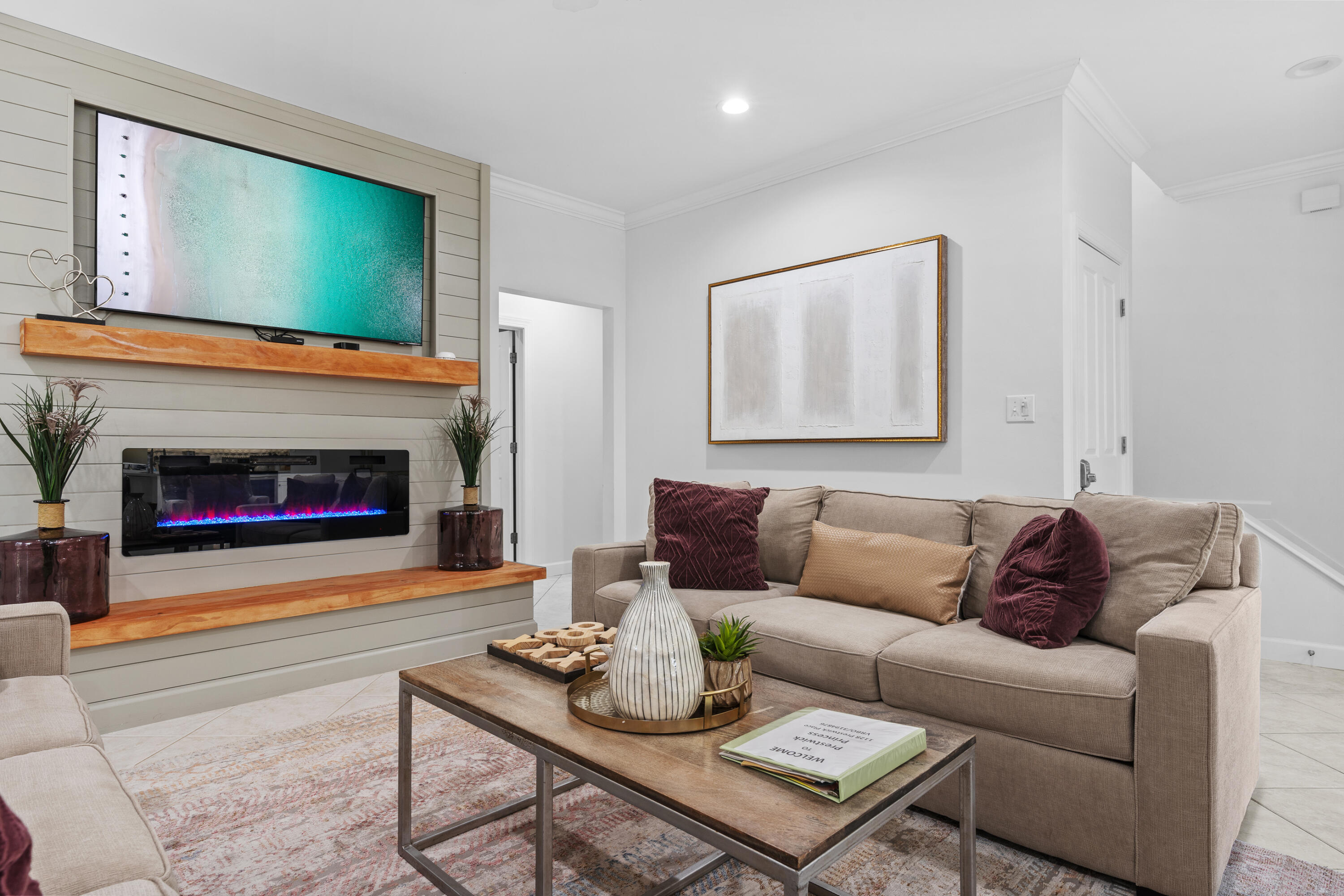 Undisclosed Address Miramar Beach, FL 32550 - Photo 5 of 51 a living room with furniture and a fireplace