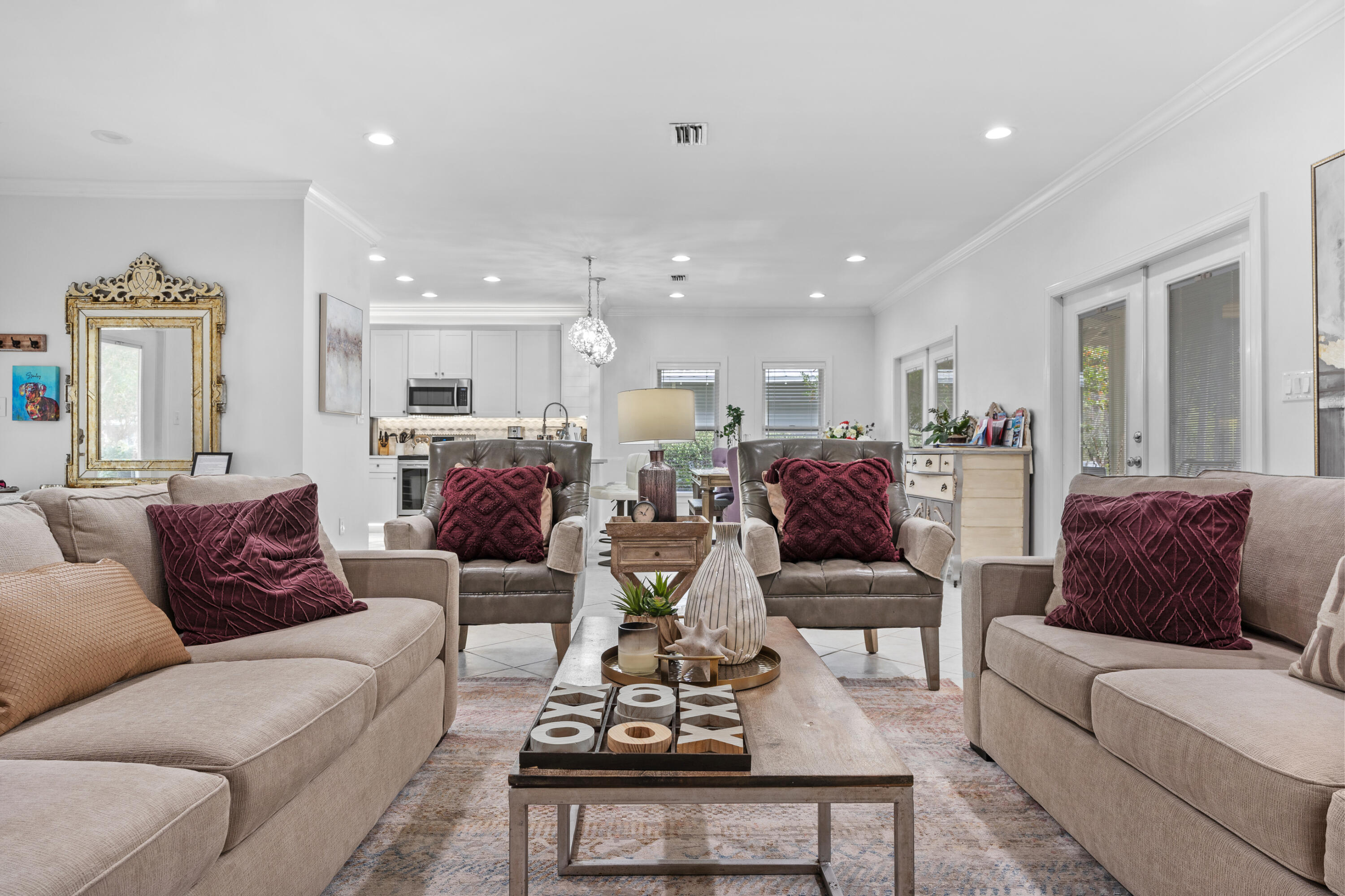 Undisclosed Address Miramar Beach, FL 32550 - Photo 6 of 51 a living room with furniture kitchen view and a chandelier