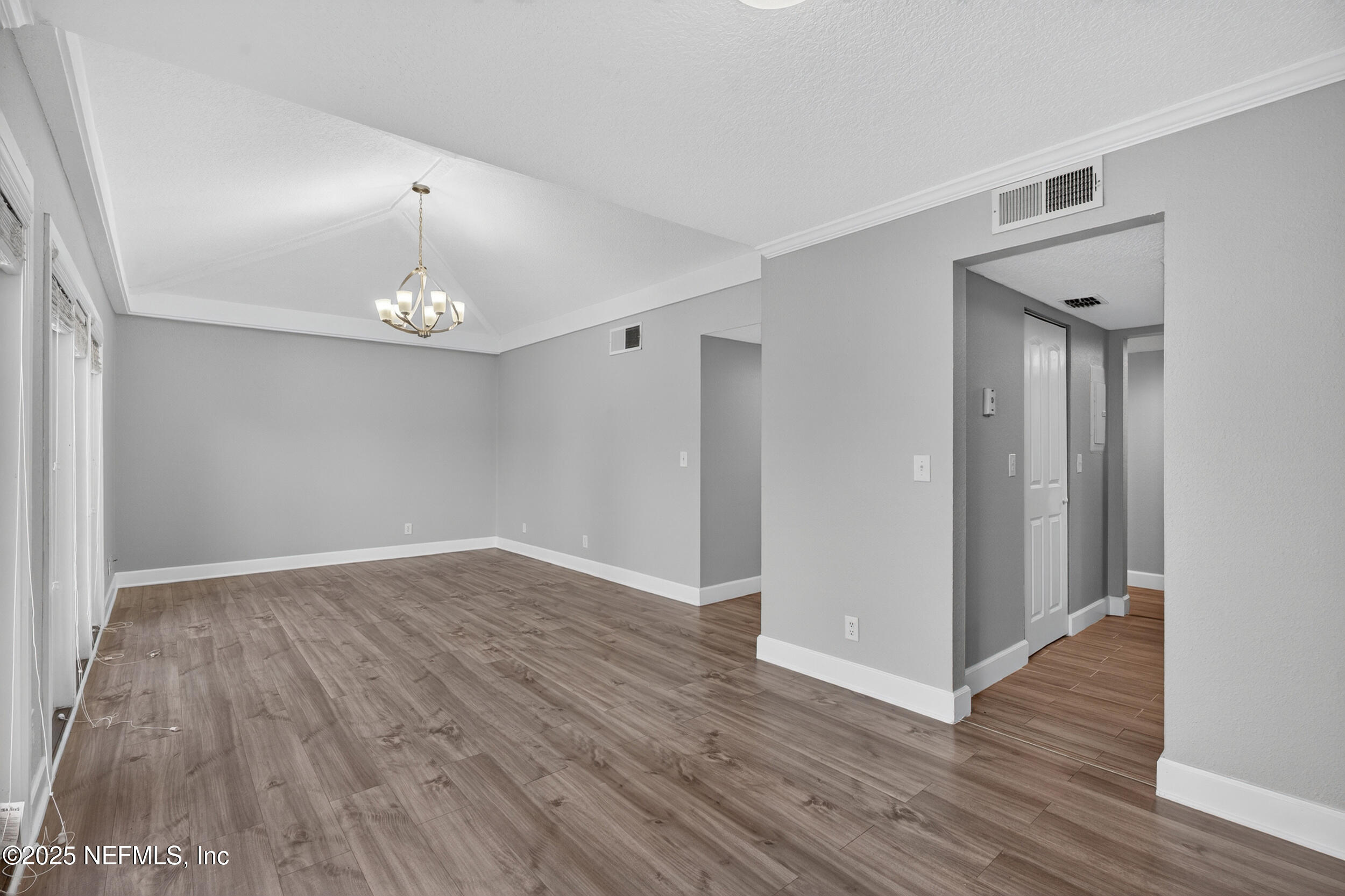 3913 Mission Drive, Unit 4 Jacksonville, FL 32217 - Photo 11 of 26 a view of empty room with wooden floor