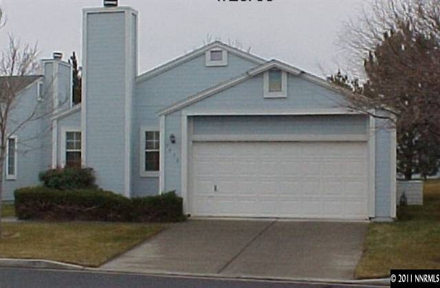 7571 Lighthouse Lane Reno, NV 89511 - Photo 1 of 1 a front view of a house with garden