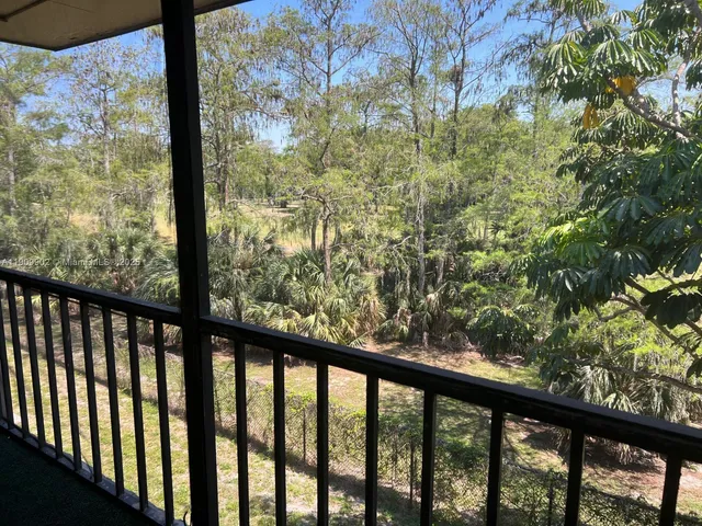 a view of a street from a balcony