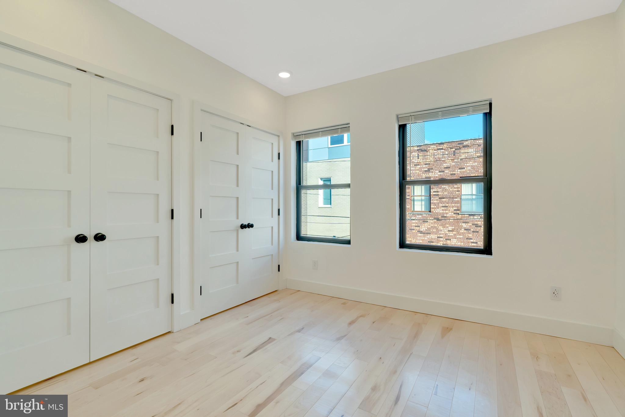 2138 Cross Street Philadelphia, PA 19146 - Photo 11 of 23 a view of an empty room with wooden floor and a window
