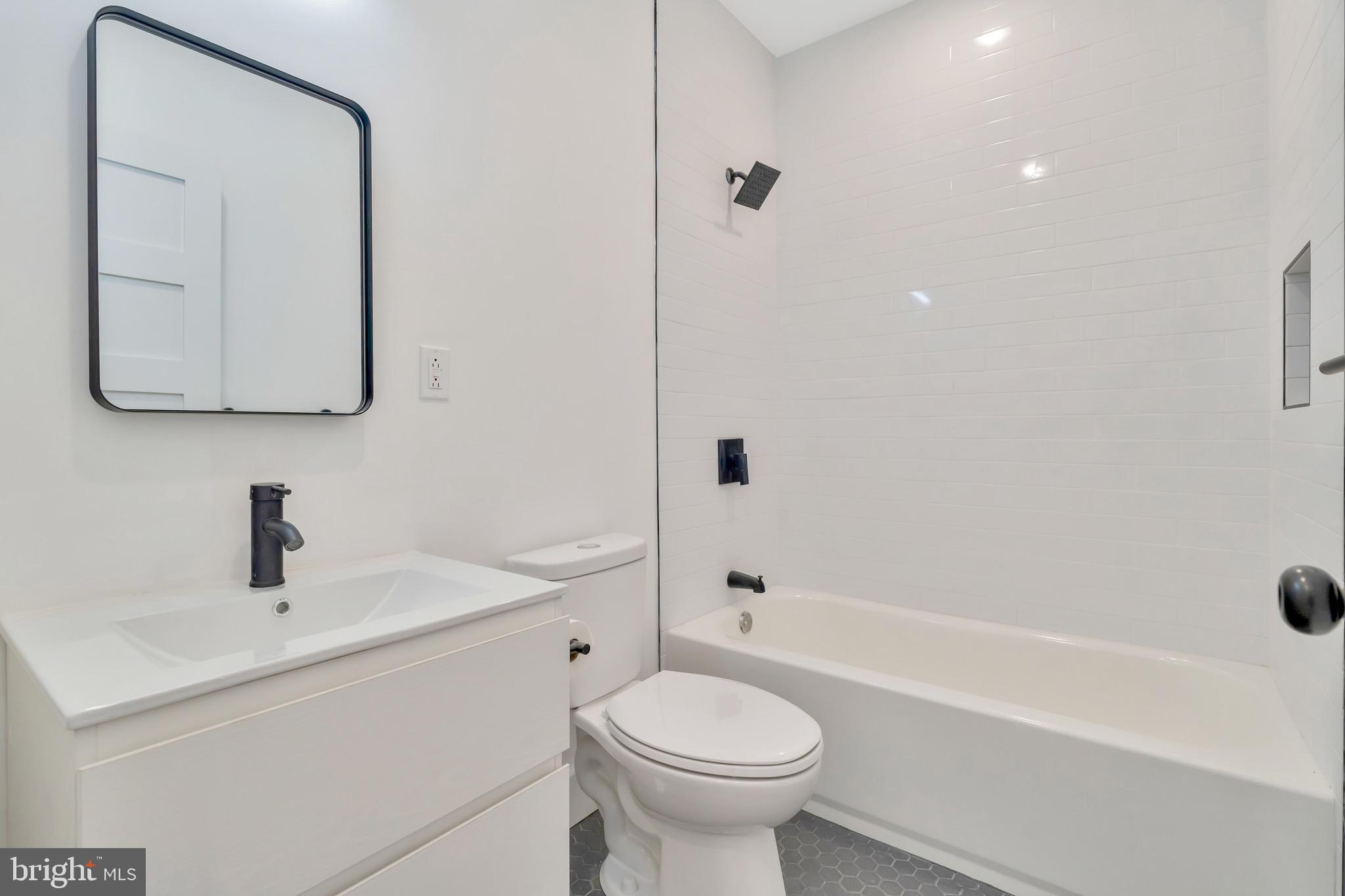 2138 Cross Street Philadelphia, PA 19146 - Photo 15 of 23 a bathroom with a sink toilet and bathtub