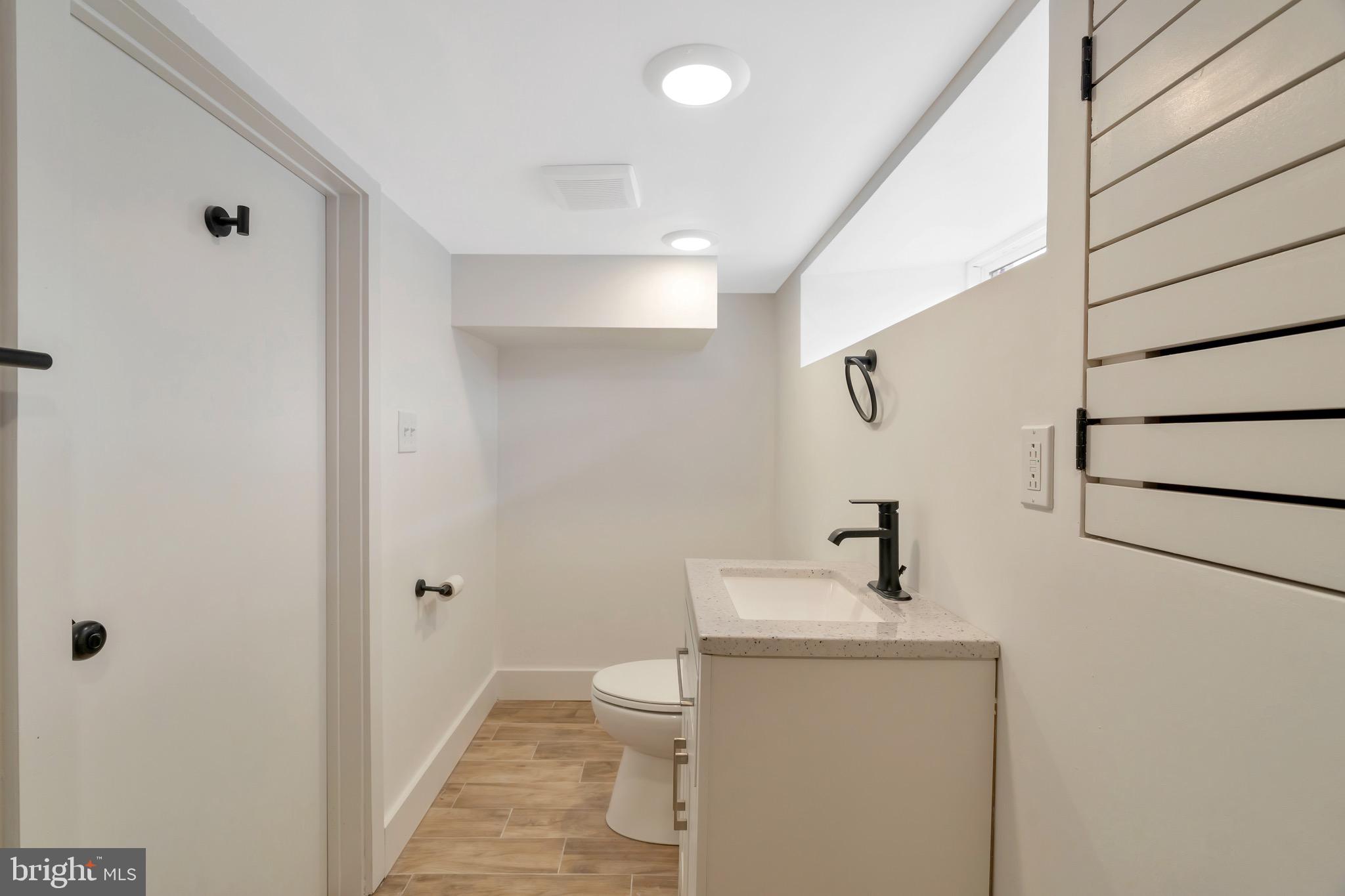 2138 Cross Street Philadelphia, PA 19146 - Photo 20 of 23 a bathroom with a sink a toilet and shower