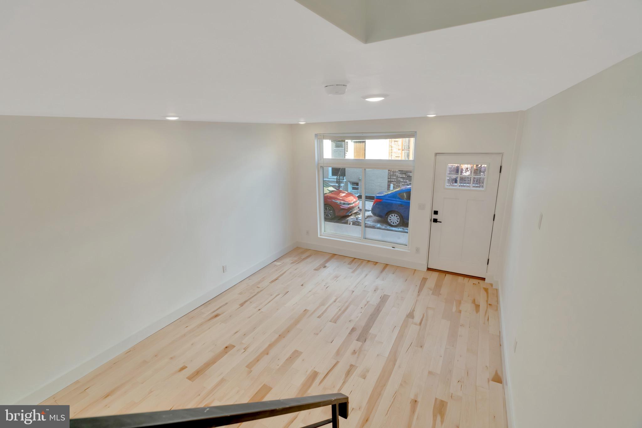 2138 Cross Street Philadelphia, PA 19146 - Photo 5 of 23 a view of a hallway with wooden floor and a cabinet