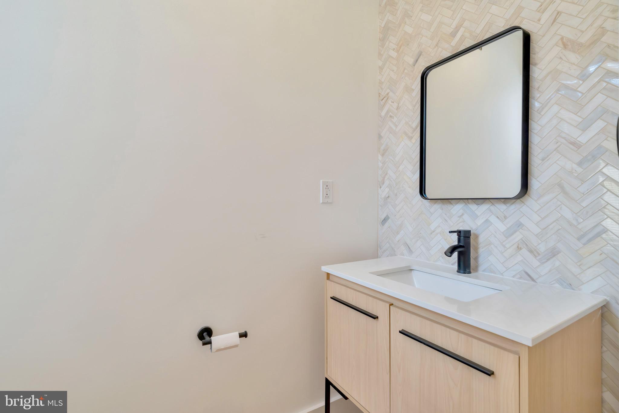 2138 Cross Street Philadelphia, PA 19146 - Photo 9 of 23 a bathroom with a sink and a mirror