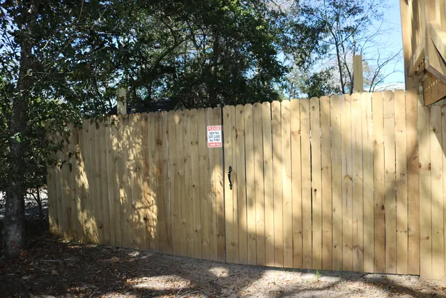 a view of a wooden fence