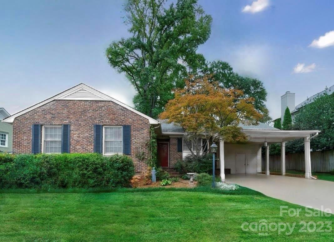 a front view of a house with a garden and porch