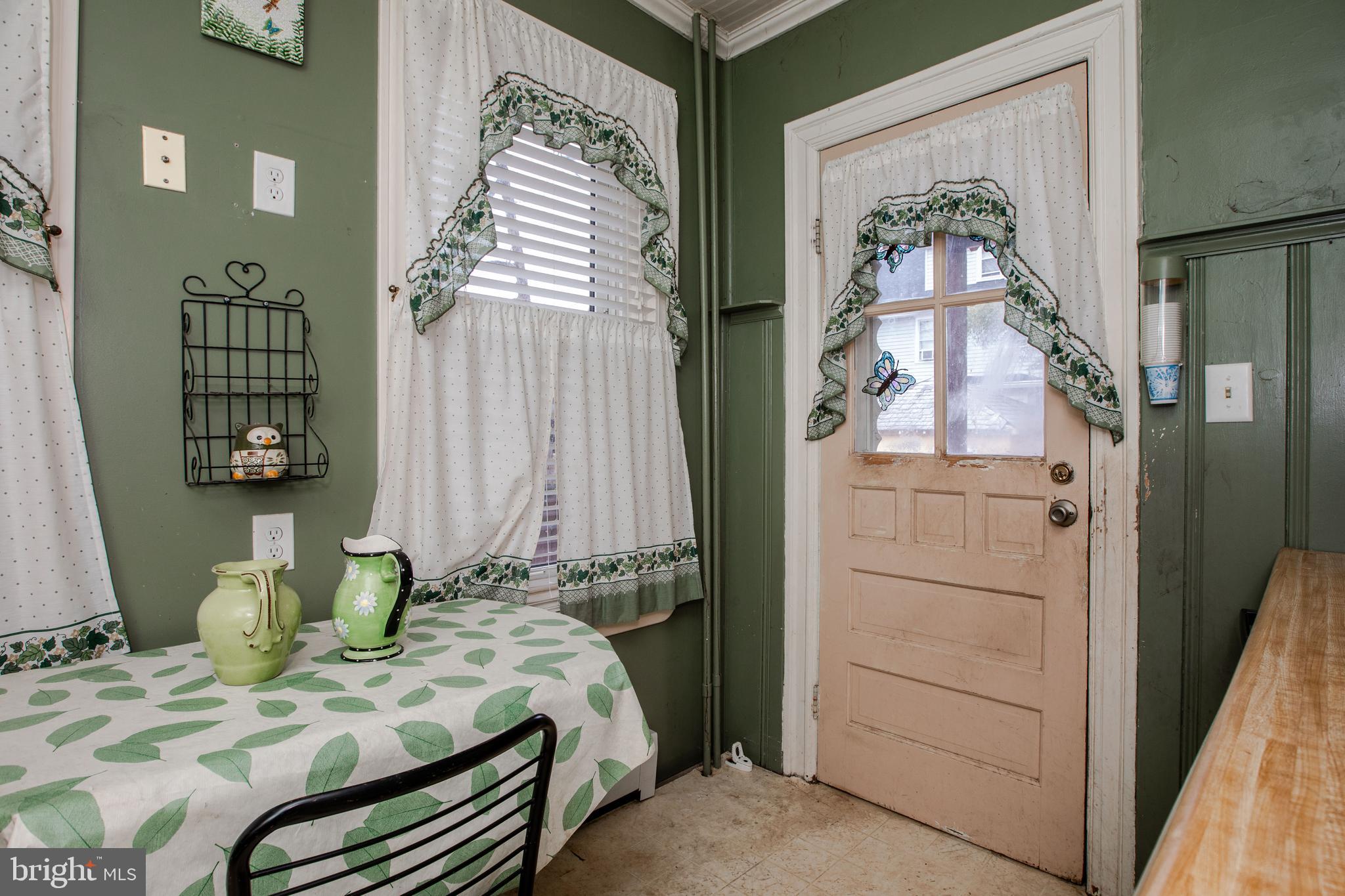 1530 Riverside Drive Trenton, NJ 08618 - Photo 16 of 36 a bedroom with a bed and a mirror