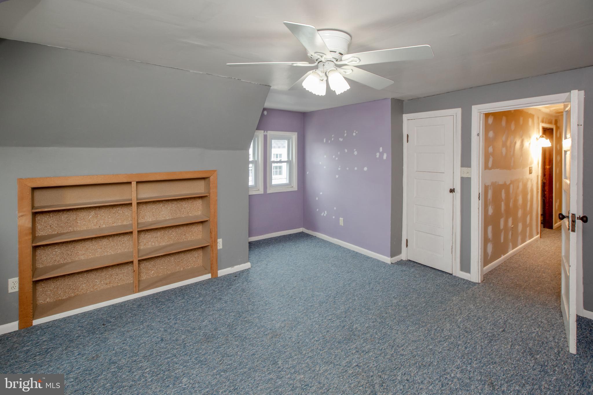 1530 Riverside Drive Trenton, NJ 08618 - Photo 29 of 36 wooden floor in an empty room with a window