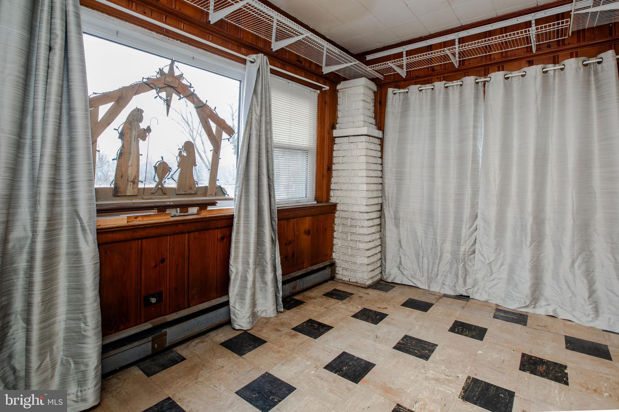 1530 Riverside Drive Trenton, NJ 08618 - Photo 7 of 36 a view of a dresser in front of a house