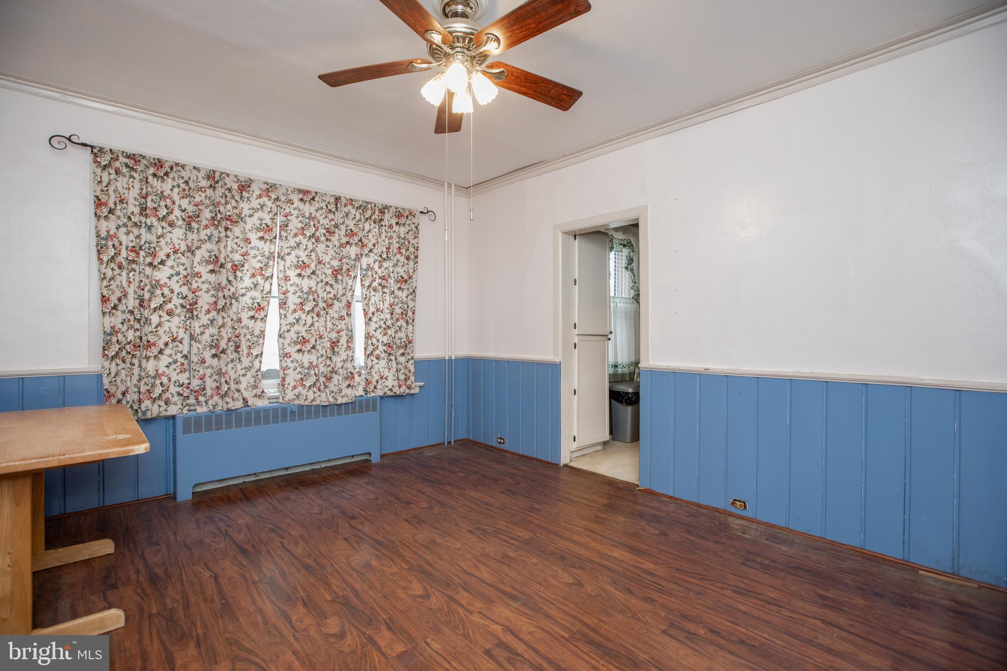 1530 Riverside Drive Trenton, NJ 08618 - Photo 10 of 36 wooden floor in an empty room with a window