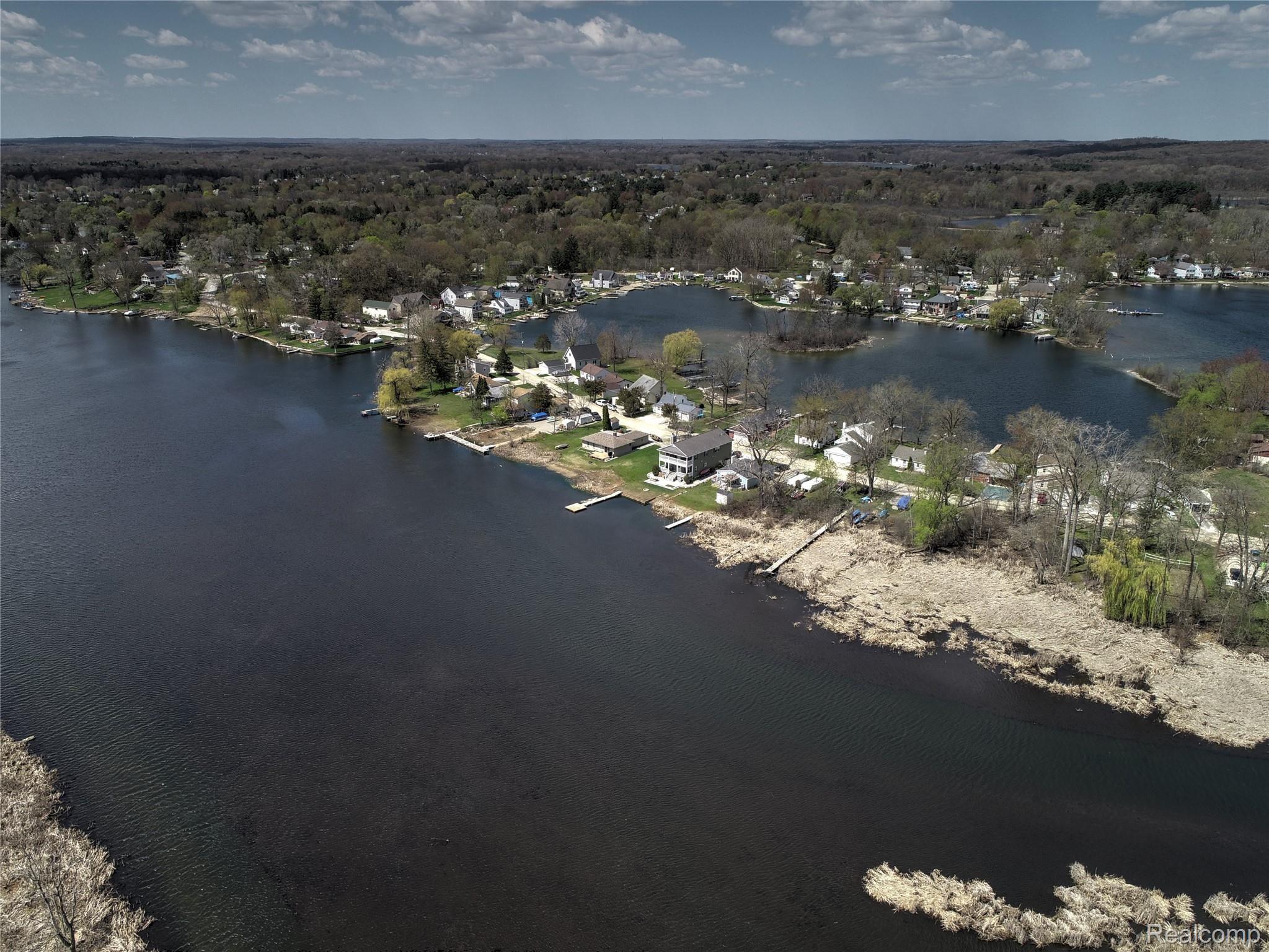 8826 Riverside Drive Brighton, MI 48116 - Photo 13 of 31 The Huron River behind the home is perfect for kayaking either to the chain of lakes or go into Huron Meadows metro park for more of a nature journey!