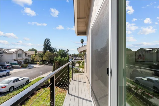 an aerial view of a house with a yard and garden