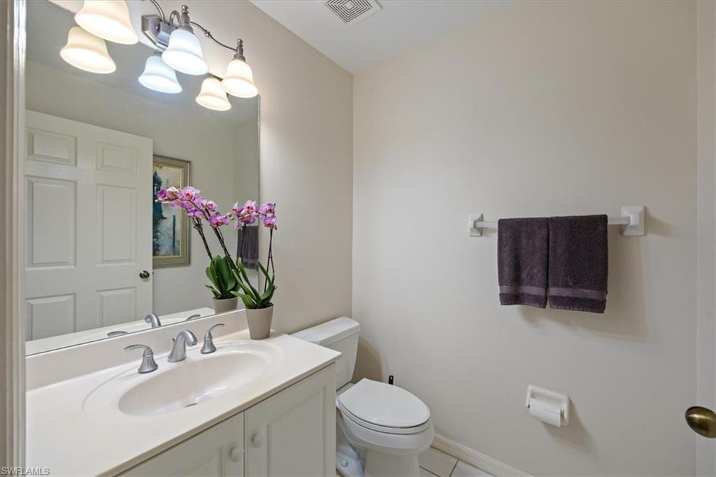 203 Via Perignon, Unit 24 Naples, FL 34119 - Photo 22 of 26 Powder room