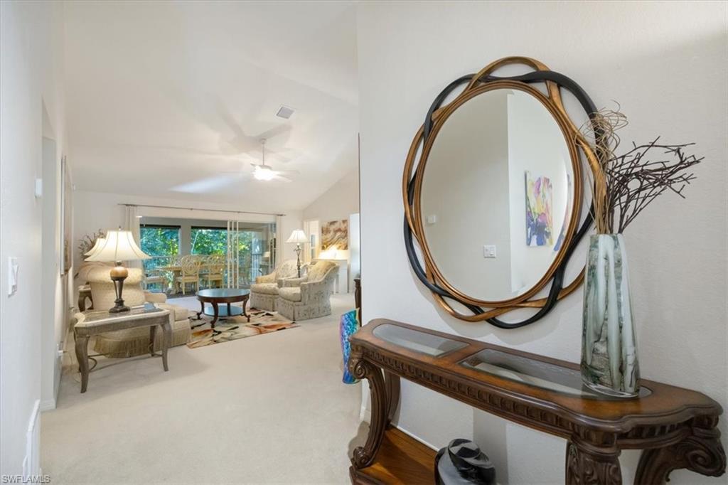 203 Via Perignon, Unit 24 Naples, FL 34119 - Photo 7 of 26 Top of stairs leads to family room