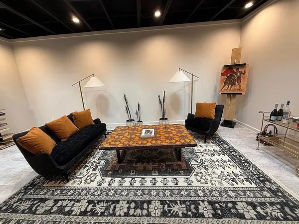 a living room with a couch and a flat screen tv