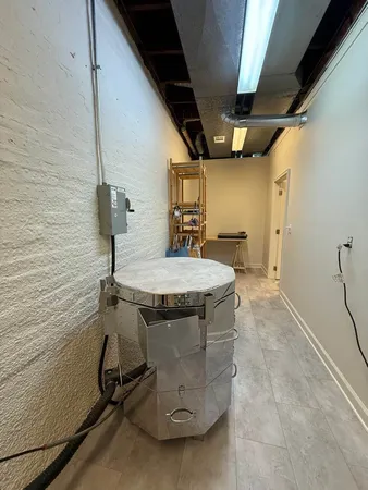 a bathroom with a sink mirror and toilet