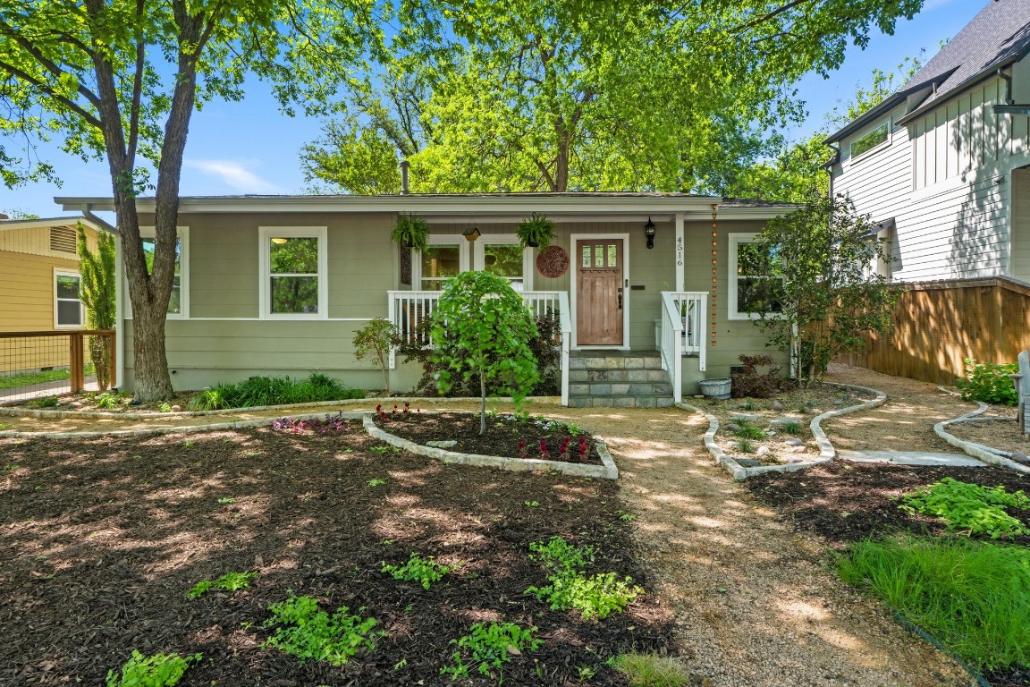 4516 Bull Creek Road Austin, TX 78731 - Photo 1 of 1 front view of a house with a yard