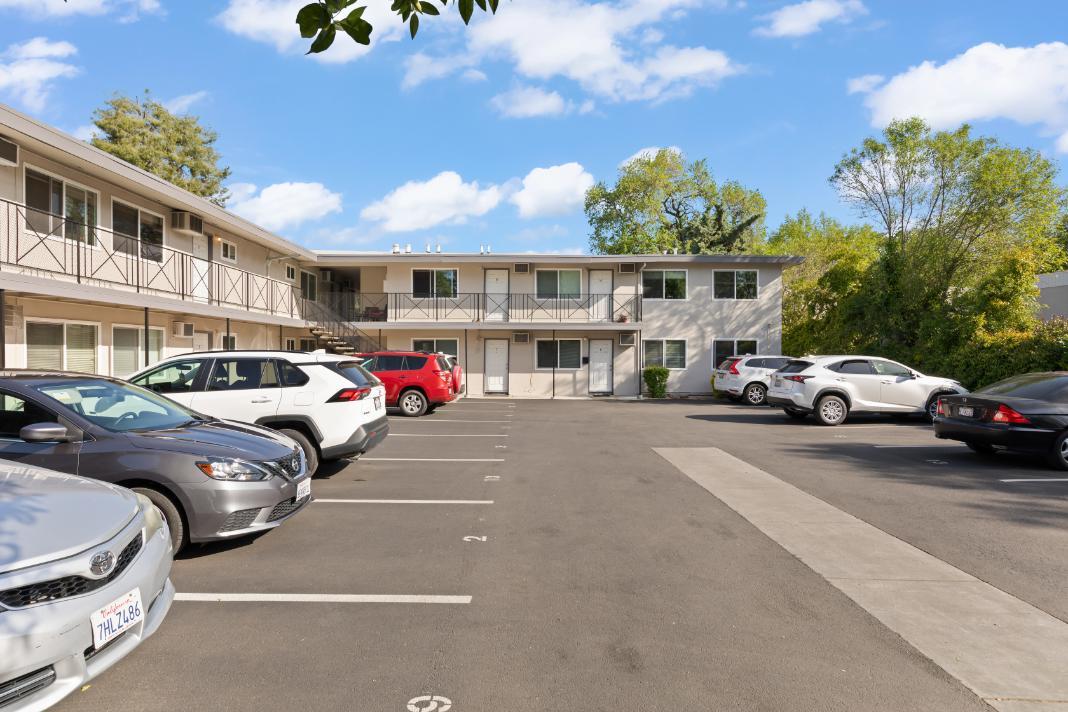 311 7th Street Davis, CA 95616 - Photo 3 of 18 a couple of cars parked in front of a building