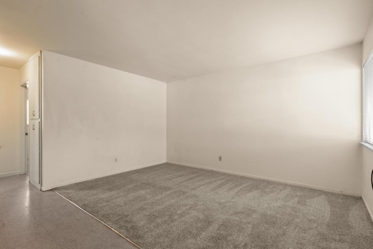 311 7th Street Davis, CA 95616 - Photo 4 of 18 an empty room with an entryway