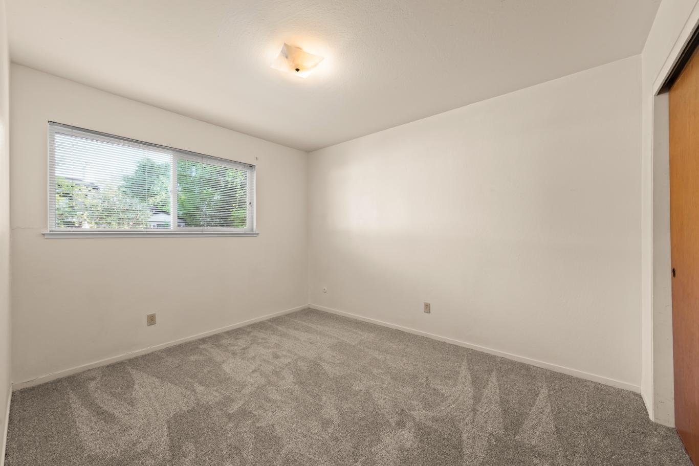 311 7th Street Davis, CA 95616 - Photo 8 of 18 an empty room with a window