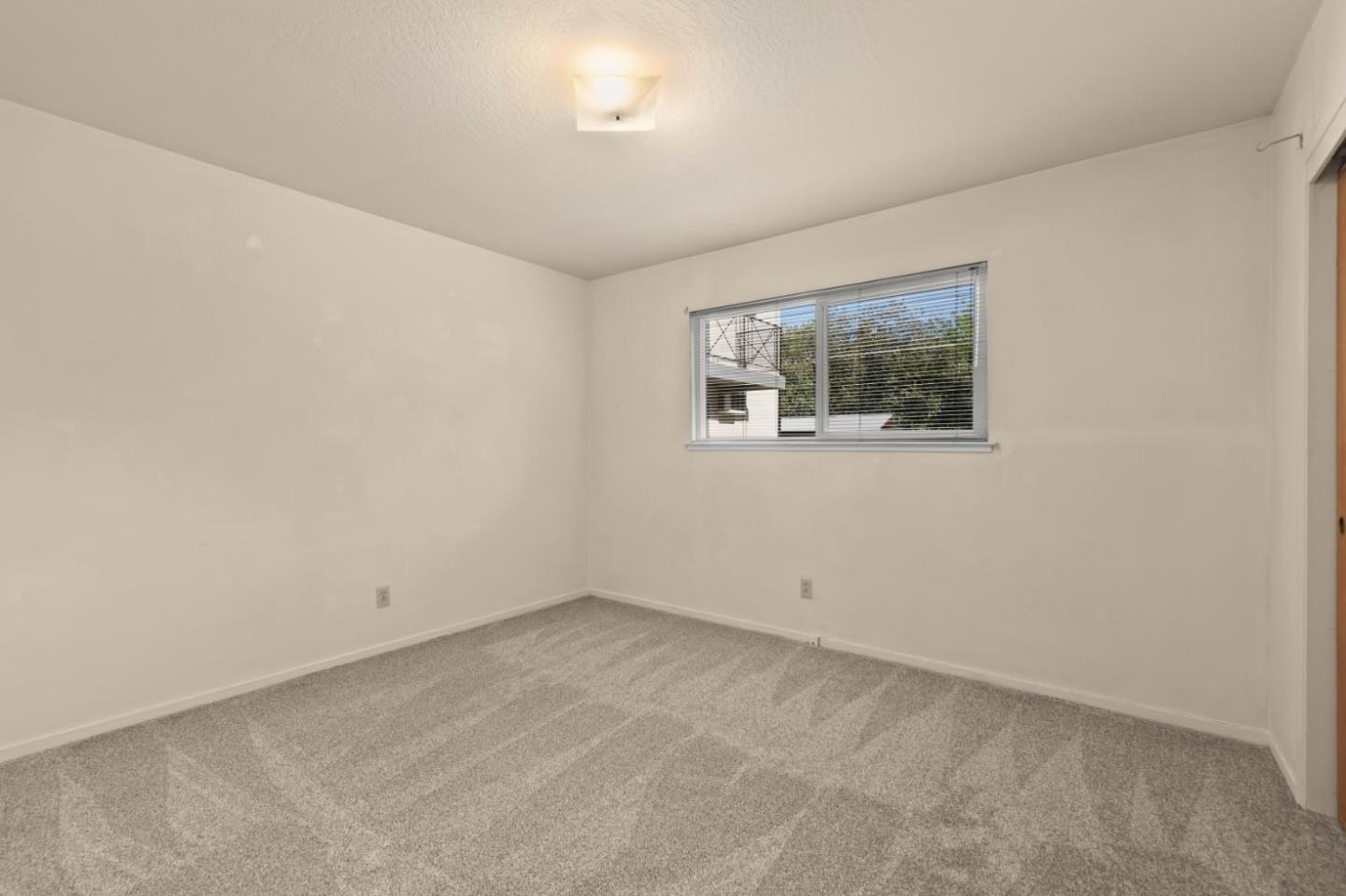 311 7th Street Davis, CA 95616 - Photo 10 of 18 an empty room with a window