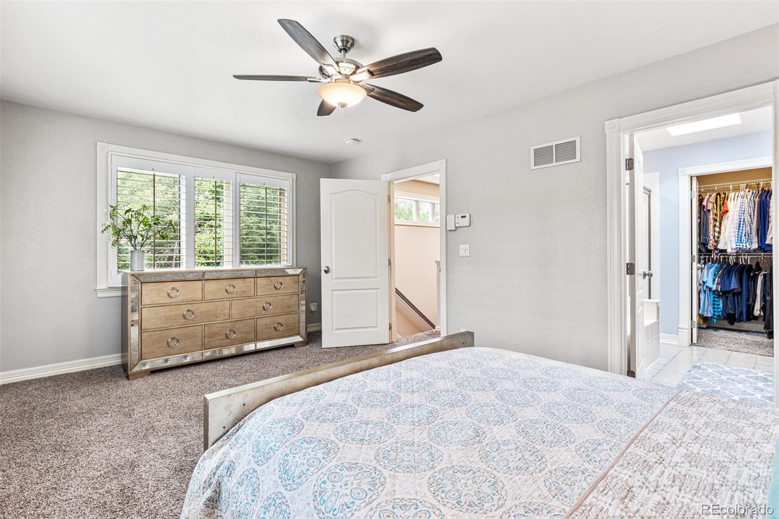 2323 Decatur Street Denver, CO 80211 - Photo 17 of 40 a bedroom with a bed and a window