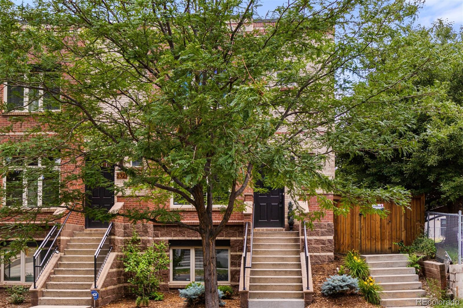 2323 Decatur Street Denver, CO 80211 - Photo 35 of 40 a front view of a house with garden