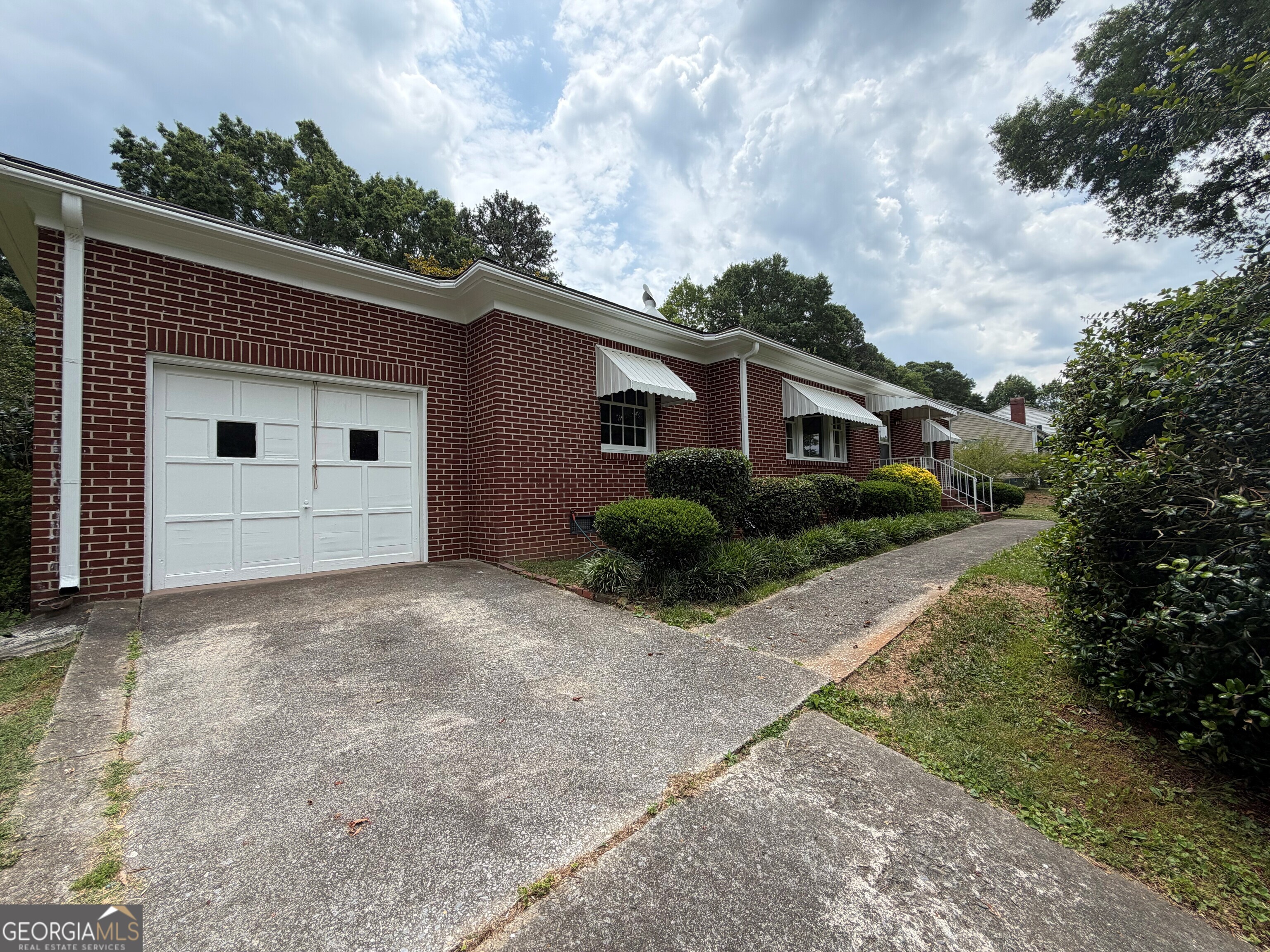 2619 Maple Road Southeast Rome, GA 30161 - Photo 2 of 31 a view of a house with a yard