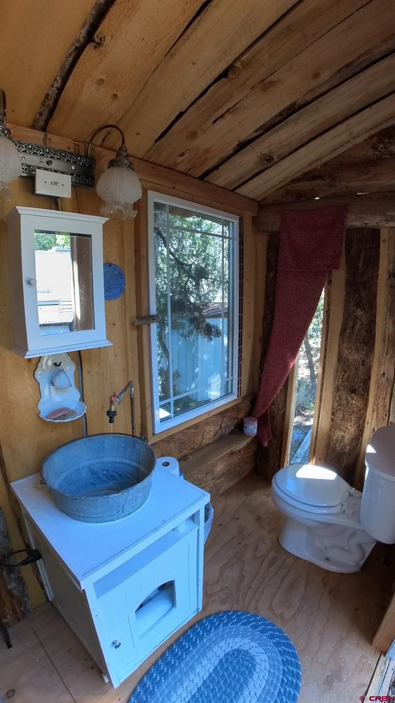 24279 Ute Trail Road Cedaredge, CO 81413 - Photo 13 of 15 a room with gym equipment