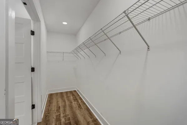 a view of a room with racks on the wall