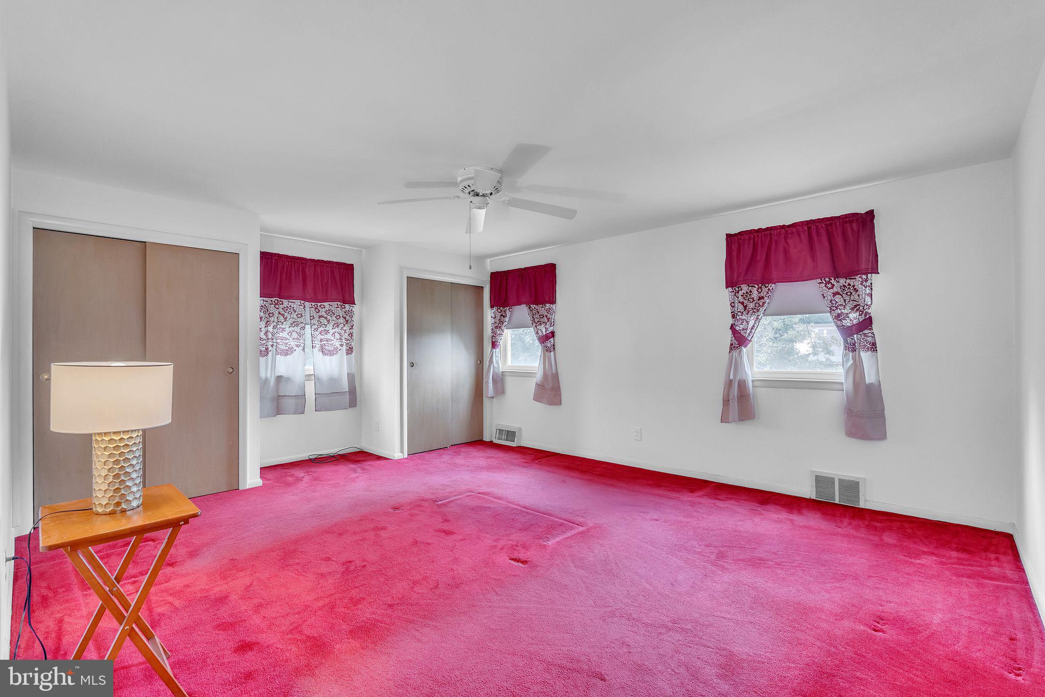 1117 Morefield Road Philadelphia, PA 19115 - Photo 15 of 30 a bedroom with a bed and a mirror
