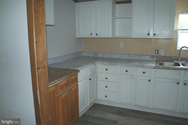 a view of cabinets and wooden closet