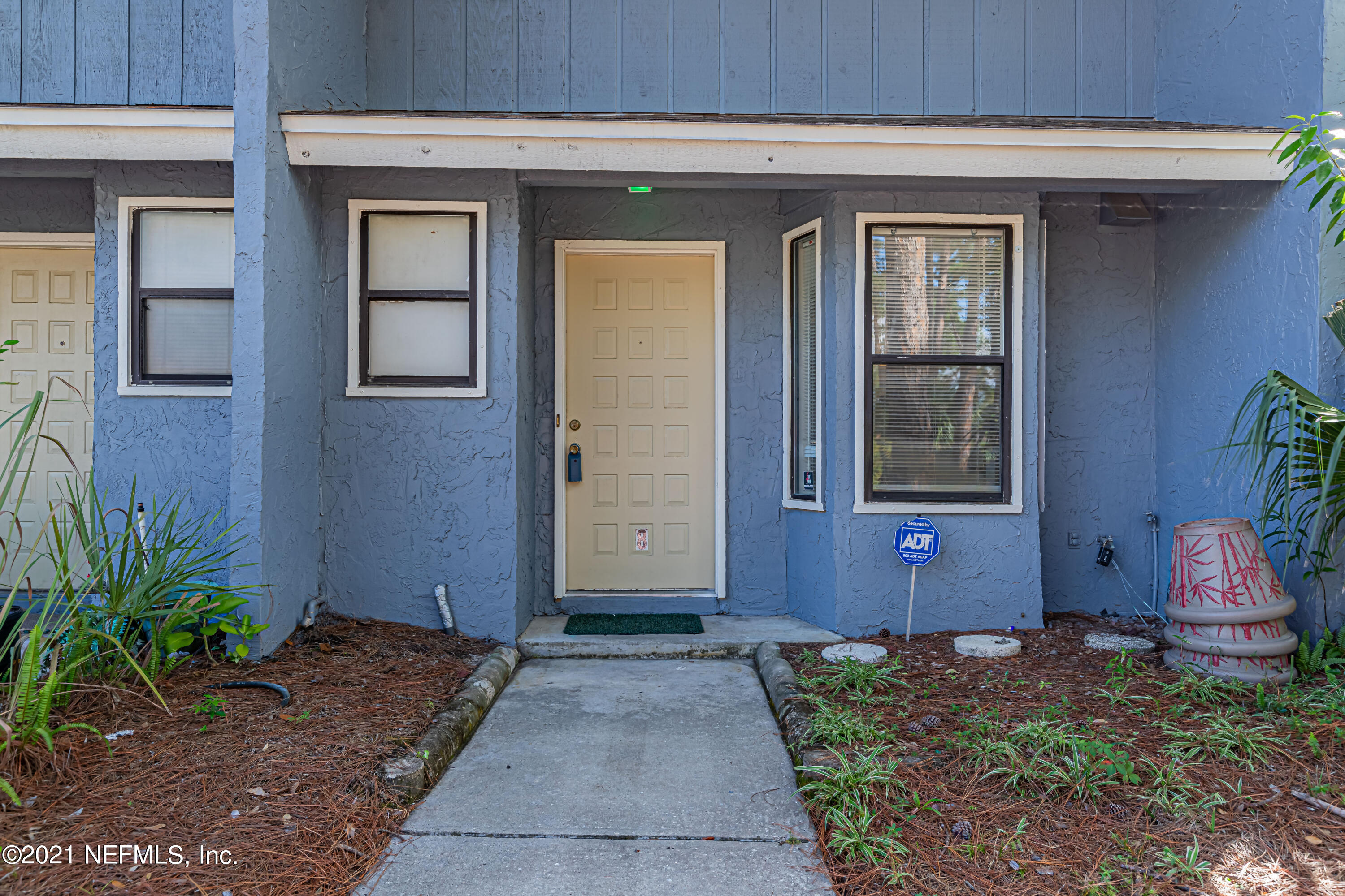 3517 Peeler Road, Unit 8 Jacksonville, FL 32277 - Photo 4 of 29 a front view of a house